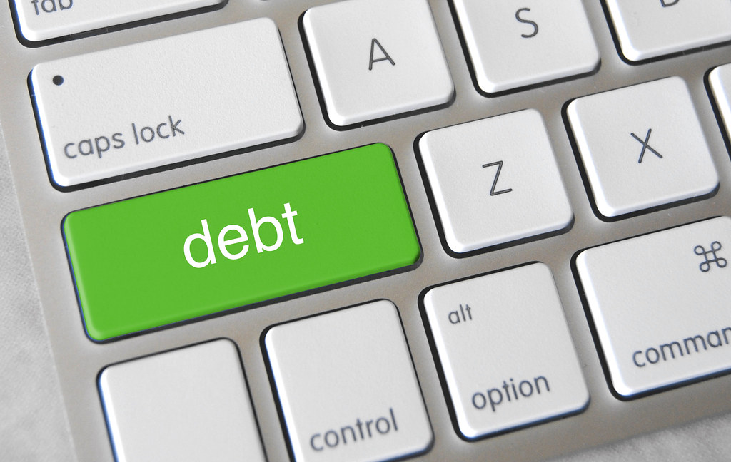 Top Reasons to Service Your Debts